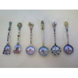 A set of six silver enamel souvenier spoons, approx 1.5 troy oz, all good condition