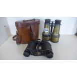 A pair of military binoculars by Ross London, together with a French Naval pair