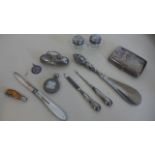 A collection of silver items, including a cigarette case, silver cased fob watch, two small silver