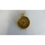 An 18ct gold cased ladies top wind fob watch with Roman numeral dial case, width exuding winder