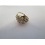 An 18ct diamond cluster ring set in yellow gold with 24 diamonds, size M, approx 5.7 grams, in