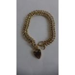 A 9ct gold chain bracelet with padlock clasp, approx 16cm long, approx 9.9grams, in good condition