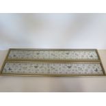 A pair of 19th century oriental embroidered sleeve bands, in grazed frames, approx frame size 12.5cm