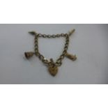 A 9ct gold charm bracelet, approx 17cm long, approx 12.7g, overall in good condition