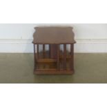 A 1930s oak revolving table book stand, approx 38cm W x 33cm H, in good condition