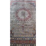 A hand knotted woollen Kashan rug - approx 302cm x 217cm - in good condition