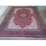 A hand knotted woollen Meshed rug - 354cm x 247cm