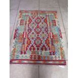 A hand knotted vegetable dye wool Chobi Kelim runner, approx 142cm x 107cm - in good condition