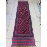 A hand knotted woollen Meshwani runner, approx 278cm x 70cm, in good condition