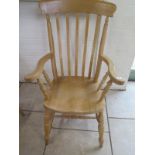 A beechwood grandfather chair, in good condition