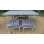 A Bramblecrest Dorset rectangle casual dining table with four Dorset casual dining stools with