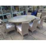 A Bramblecrest Sahara table and eight chairs with cushions - ex display