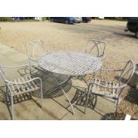 A metal garden table and chairs, 110cm diameter