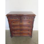 A 19th century mahogany five drawer chest with original glass handles