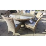 A Bramblecrest Sahara 150cm round table and six Foxham side chairs with cushions, ex-display