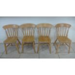 A set of four modern beechwood kitchen chairs