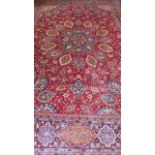 A hand knotted woollen Araak rug - approx 363cm x 267cm, in good condition