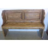 A Victorian style pine hall bench, 90cm tall x 137cm x 42cm