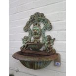 A cast iron wall feature - 50cm high