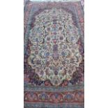 A hand knotted, woollen fine Sarough rug, approx 235cm x 140cm