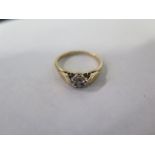 An 18ct gold illusion set diamond ring, size K/L, approx 1.9 grams, in good condition