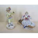 A Meissen figurine of a 17th century gentleman tennis player, approx 16cm high, with old repair to