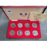 A boxed set of eight silver proof crowns for the queens Silver Jubilee, approx 7.2 troy oz