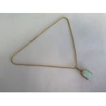 An opal pendant and necklace, both 9ct yellow gold, total weight approx 9 grams, minor break to