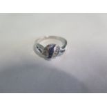 A sapphire and diamond dress 18ct white gold ring, twelve stones, trap cut, colour Blue assessed,