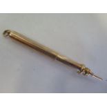 A 15ct yellow gold propelling pencil, approx 8.9 grams, 8cm long extended