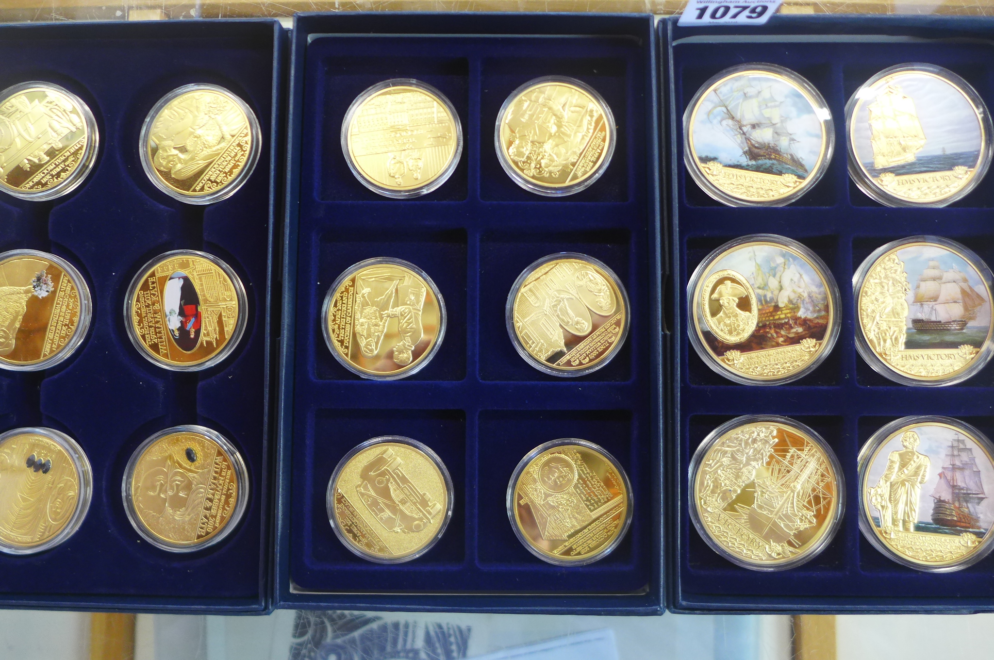 Three sets of six gold plated CU commemorative coins