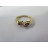 An 18ct gold ruby and diamond ring, size M, approx 3.2 grams, in good condition