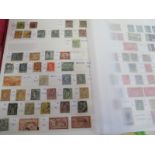 A large stock-book with a range of World stamps present but with strength in a collection of