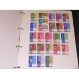 A collection of World stamps, both loose and in seven albums