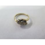 A 9ct gold three stone diamond ring, size L, approx 2.4 grams, in good condition