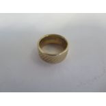 A 9ct yellow gold band ring, size I, approx 4 grams, generally good, some usage marks