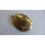 A 9ct gold locket, approx 18 grams, approx 5cm oval, in good condition
