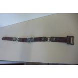 A silver and crocodile belt, 65cm long