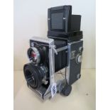 A Mamiya C33 professional twin lens Reflex camera, with Mamiya-Sekor 1.2.8 F80mm lens, no 57663