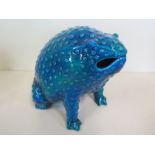 A large blue green ceramic toad with crazed effect glaze, 20cm tall, overall good, some paint