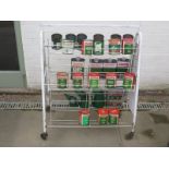 A Castrol Oil garage forecourt display rack, together with three Castrol oil cans, five tins of