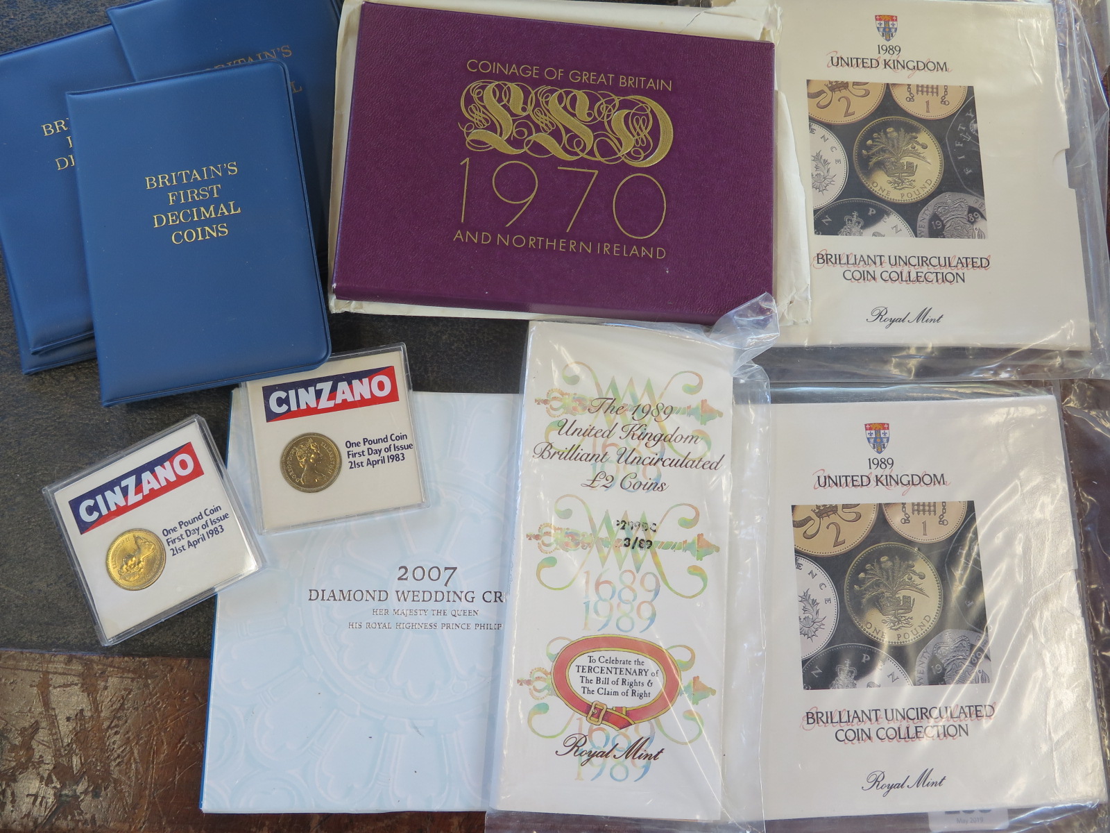 A collection of British coinage, including un-circulated British coins, first decimal coin sets