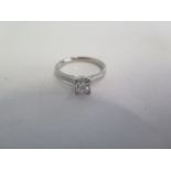 A platinum modern diamond solitaire ring, diamond princess cut, colour G/H, clarity VVS2/VS1,