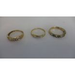 A 9ct gold and diamond band ring, and two other 9ct gold rings, one set with white stones the