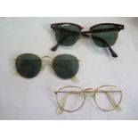Two pairs of Ray-Ban sun glasses together with a pair of Ray-Ban frames, overall in good condition