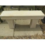 A natural limestone garden bench, 93cm wide