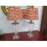 A pair of good quality glass and chrome table lamps, in good condition - 83cm high