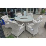 A Bramblecrest sample six seater round dining set with Lazy Susan, ex-display