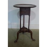 A Georgian mahogany two drawer wig stand with a later added circular top, 74cm tall x 44cm diameter