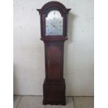 A mahogany 8 day striking longcase clock with a silver arched 12 inch dial, signed John Day of Deal,